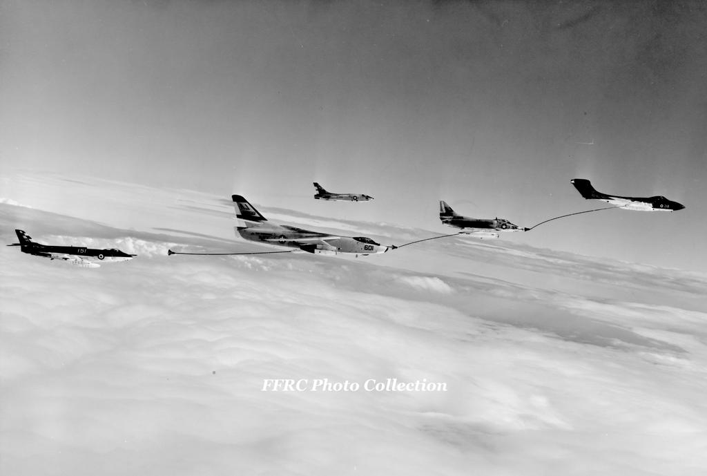 royal_navy_and_usn_daisy_chain_aerial_refueling_by_fighterman35-d9r2ufu.jpg