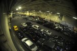 US_Navy_120109-N-EE987-271_Vehicles_of_Sailors_are_stored_in_the_hangar_bay_of_the_aircraft_ca...jpg