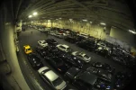 US_Navy_120109-N-EE987-271_Vehicles_of_Sailors_are_stored_in_the_hangar_bay_of_the_aircraft_c...webp