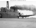 SNJ on deck of USS Sable 1945.webp
