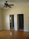 dining room looking into downstairs bdrm and bath.webp