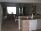 condo liv rm kitchen 1.webp