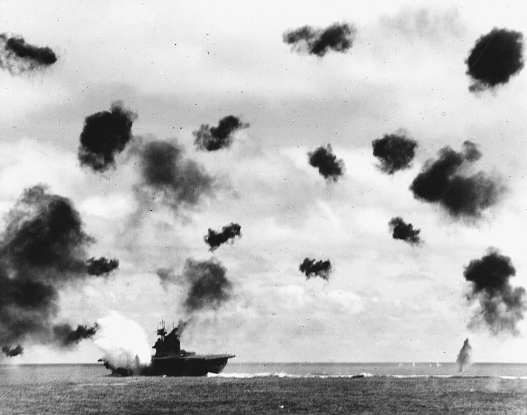 1024px-USS_Yorktown_%28CV-5%29_is_hit_by_a_torpedo_on_4_June_1942.jpg