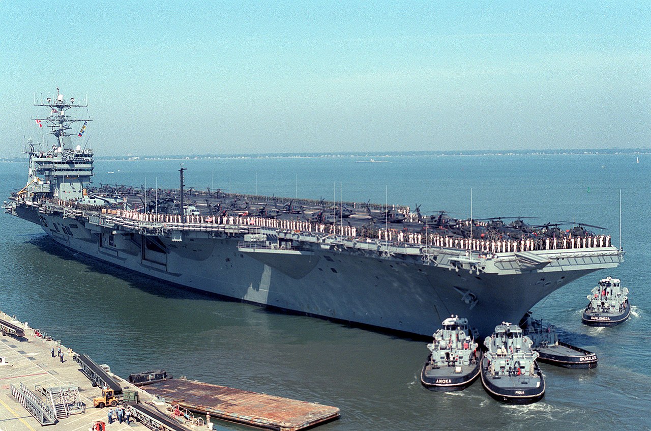 1280px-USS_Eisenhower_%28CVN-69%29_leaves_Norfolk_for_Operation_Uphold_Democracy_in_1994.JPEG
